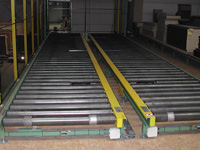 Rolbanen voor stapels houten platen